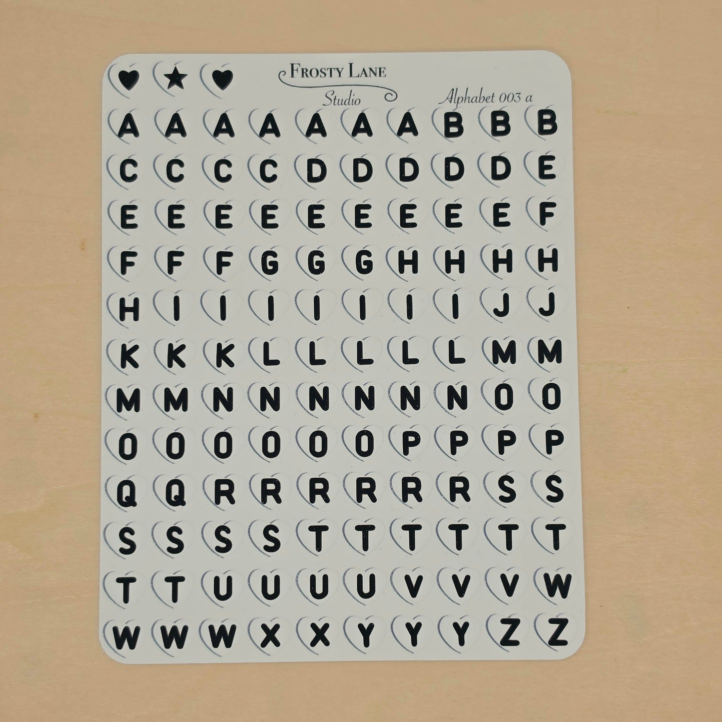Alphabet 003.a black letters and white heart