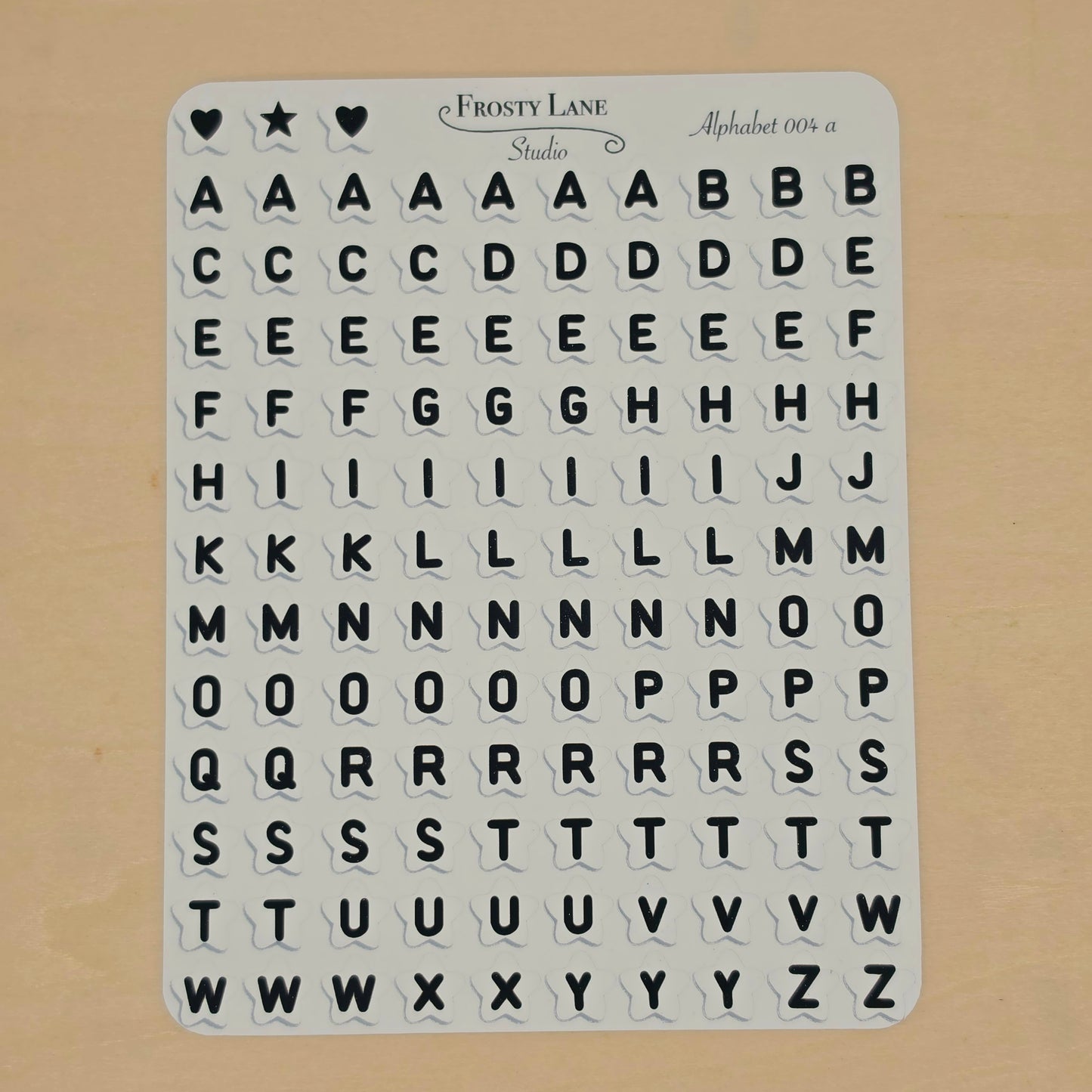 Alphabet 004.a black letters and white star