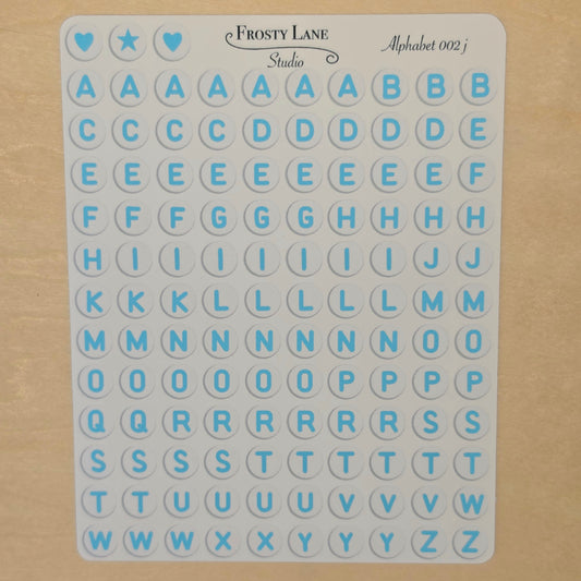 Alphabet 002.j. blue letters and white circle