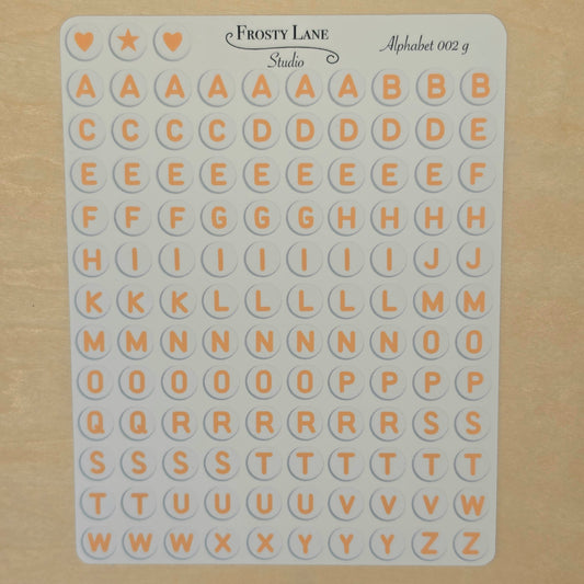 Alphabet 002.g. orange letters and white circle