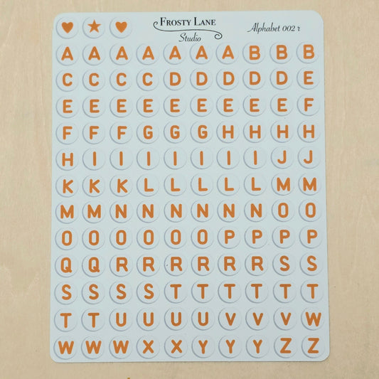 Alphabet 002.r. Brown letters and white circle