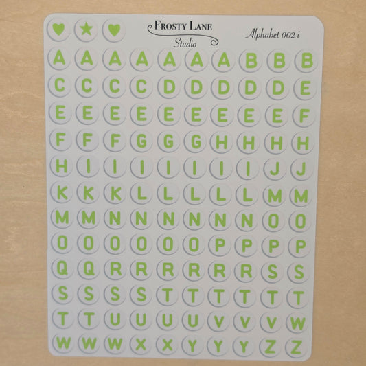 Alphabet 002.i. green letters and white circle