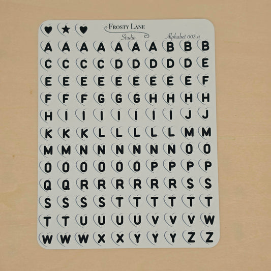 Alphabet 003.a black letters and white heart