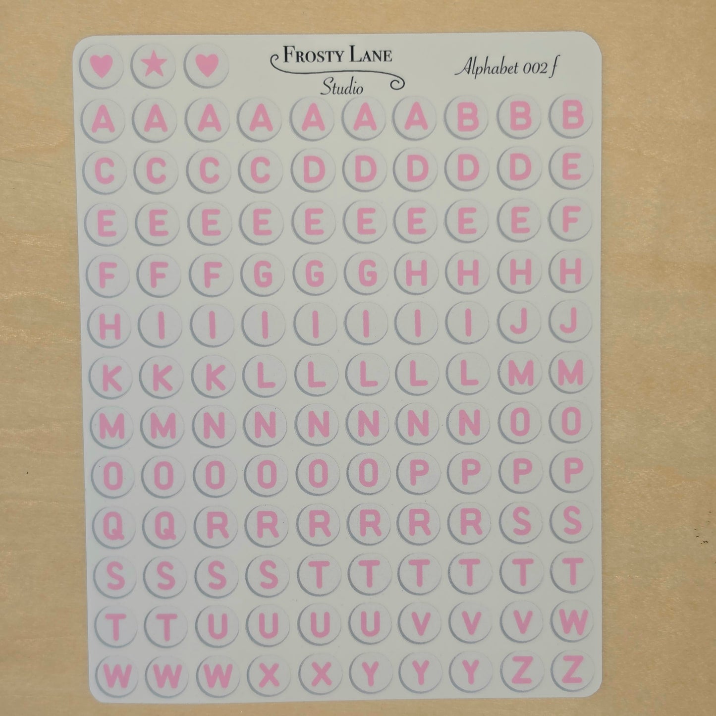 Alphabet 002.f. pink letters and white circle