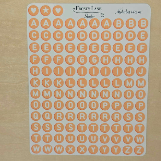 Alphabet 002.m. white letters and orange circle