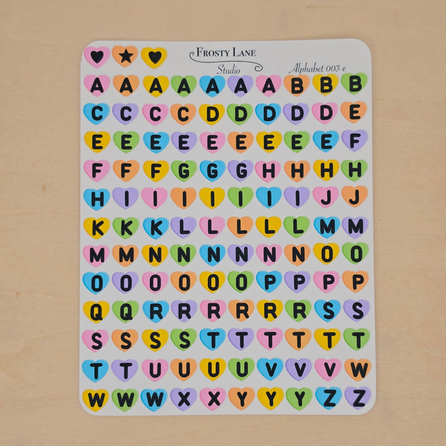 Alphabet 003.d black letters and rainbow heart