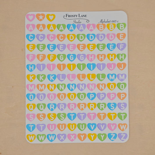 Alphabet 003.c white letters and rainbow heart