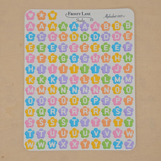 Alphabet 005.c. white letters and rainbow flower