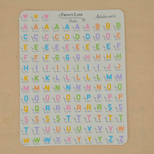 Alphabet 005.b. rainbow letters and white flower