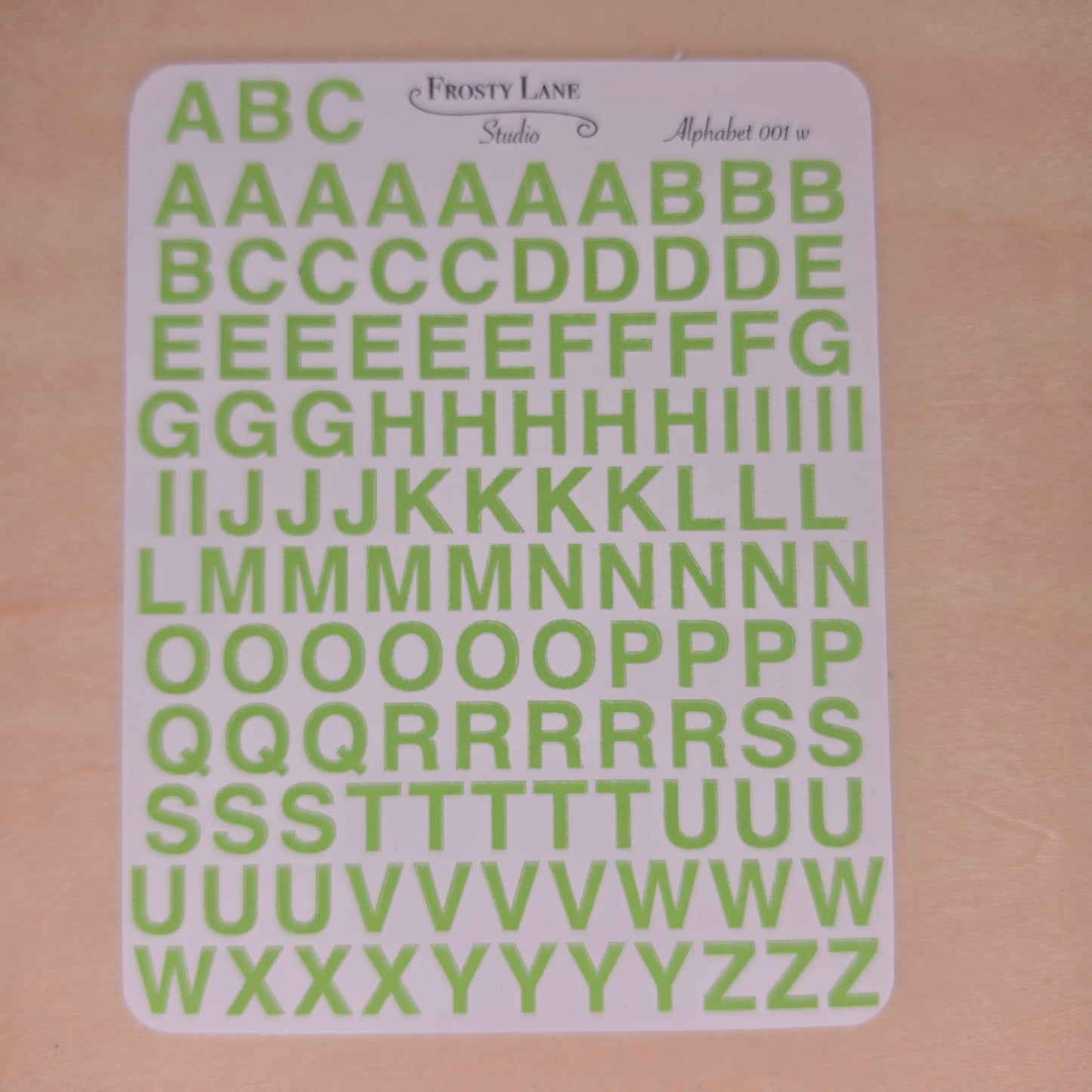 Alphabet 001.w. pastel green