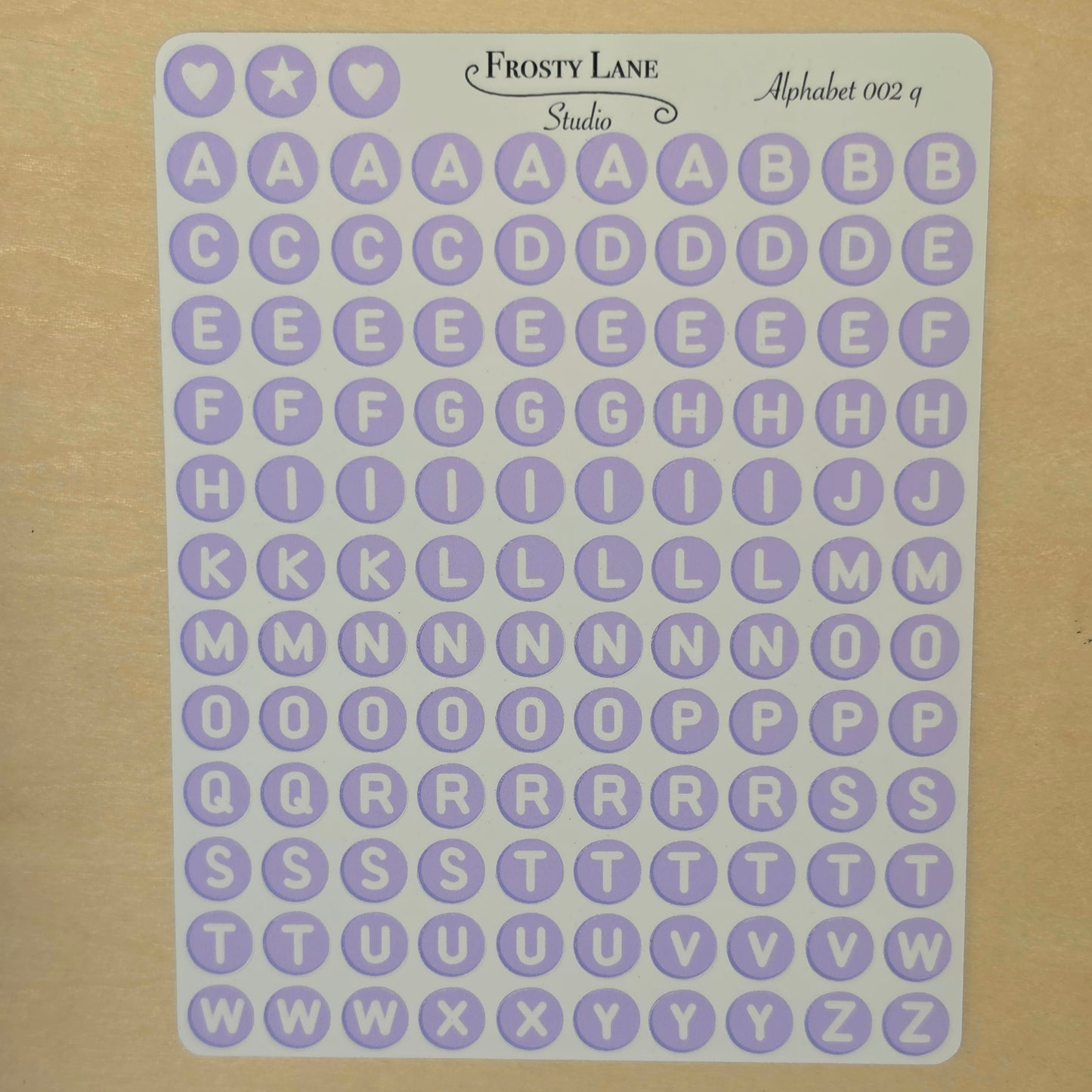 Alphabet 002.q. white letters and purple circle