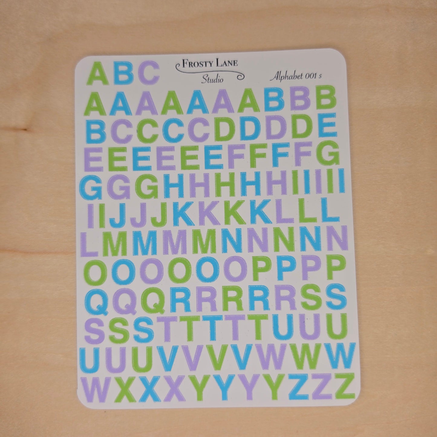 Alphabet 001.s. pastel green blue purple