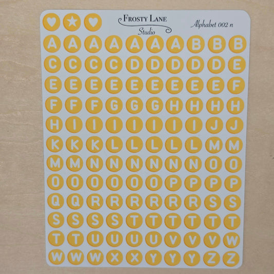Alphabet 002.n. white letters and yellow circle