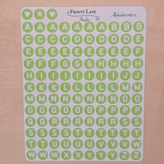 Alphabet 002.o. white letters and green circle
